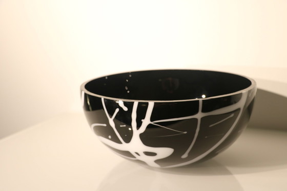 Image 1 of Bowl Of Black Glass With White Glass Decorations