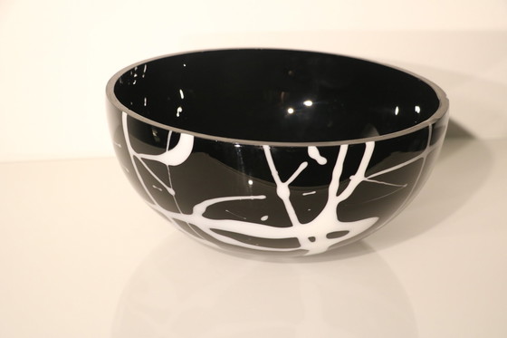 Image 1 of Bowl Of Black Glass With White Glass Decorations