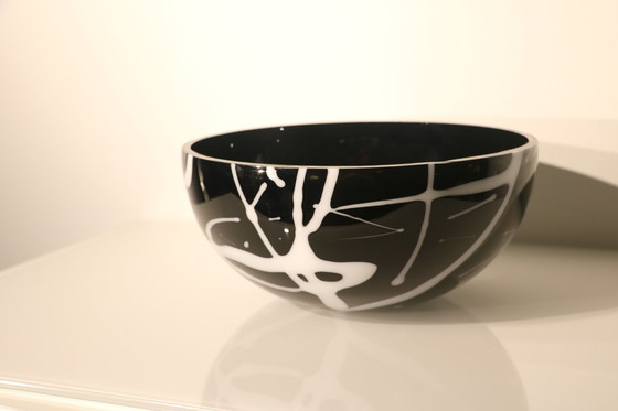 Image 1 of Bowl Of Black Glass With White Glass Decorations