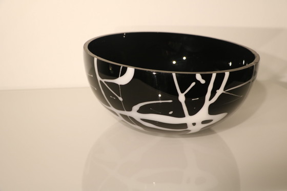 Image 1 of Bowl Of Black Glass With White Glass Decorations