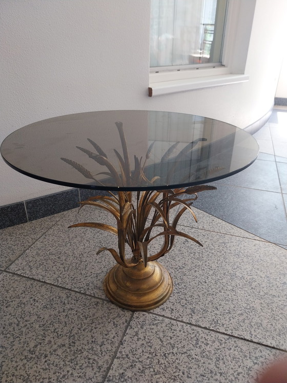 Image 1 of 1 x Hans Kögl table d'appoint coco or. plateau en verre fumé.  58cm de diamètre 47cm de hauteur.