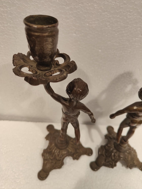 Image 1 of Vintage Solid Bronze Boy Candlestick Set Of Two