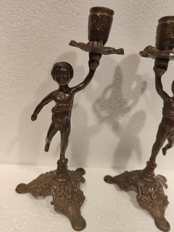 Image 1 of Vintage Solid Bronze Boy Candlestick Set Of Two