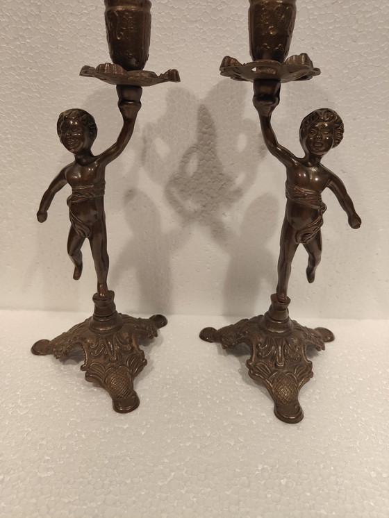 Image 1 of Vintage Solid Bronze Boy Candlestick Set Of Two