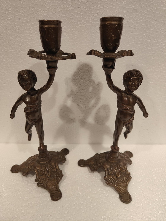 Image 1 of Vintage Solid Bronze Boy Candlestick Set Of Two