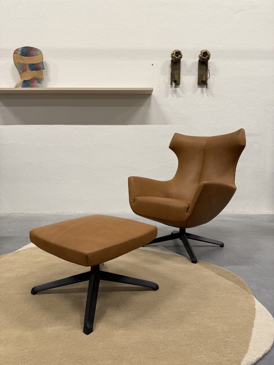 Image 1 of Design On Stock Nosto Armchair With Hocker Loxton Leather Cave