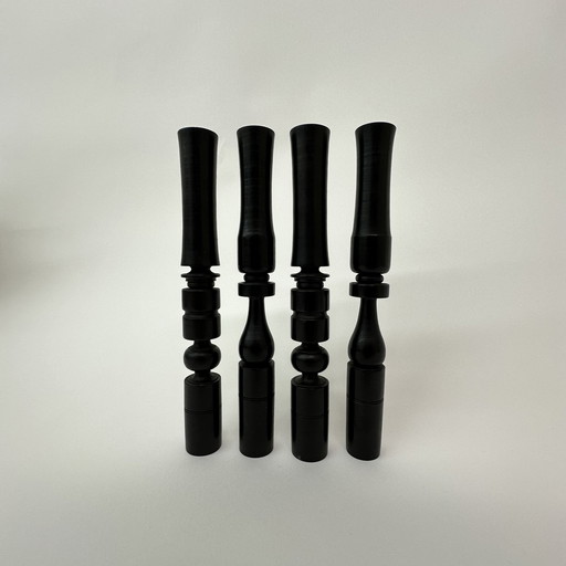 Set of 4 hand-turned candlesticks in ebony wood, 1900