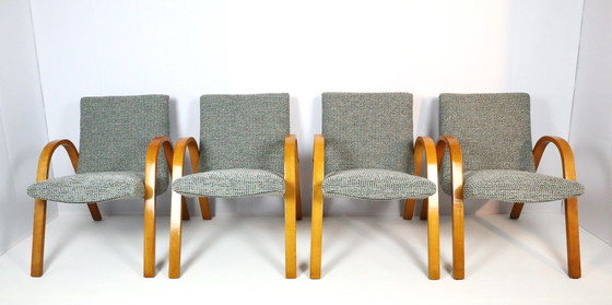 Image 1 of 4x Bow Wood armchairs 1950