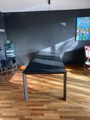 Extenso dining table in black oak