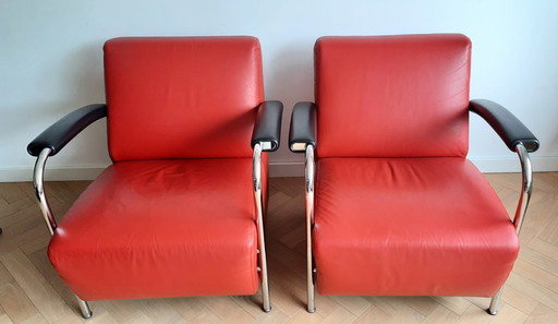 2x Leolux red Scylla leather chairs