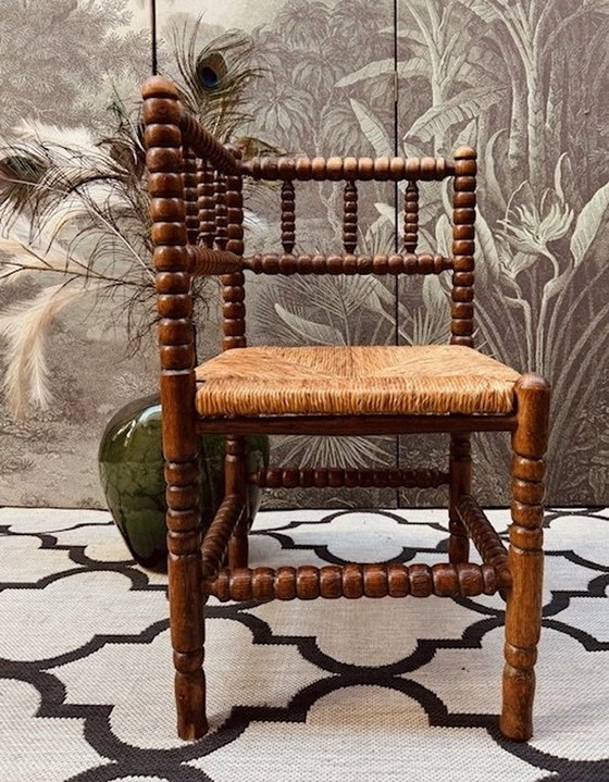 Image 1 of Vintage Brutalist Bobbin Oak Corner Chair With Braided Piping Matt