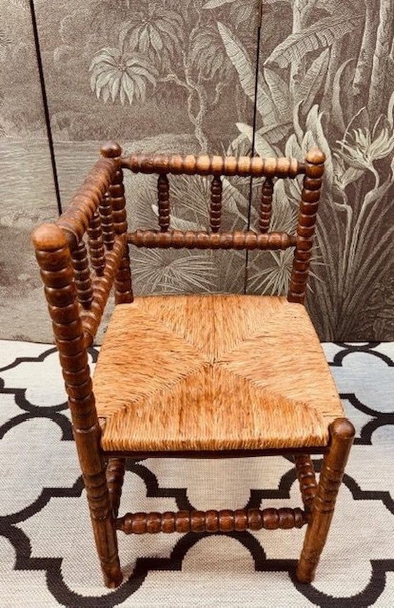 Image 1 of Vintage Brutalist Bobbin Oak Corner Chair With Braided Piping Matt