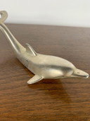 Abridor de botellas Dolphin, 1970-80