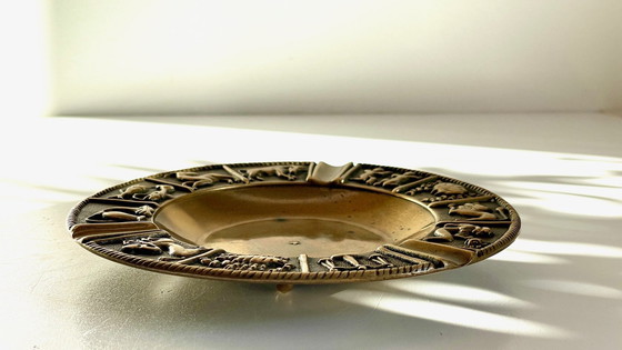 Image 1 of Posacenere vintage in bronzo con segno zodiacale
