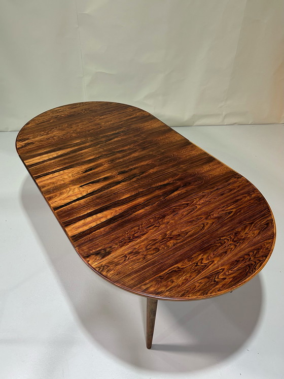 Image 1 of Extendable dining table rosewood Danish