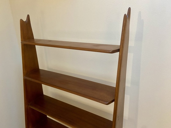 Image 1 of Mahogany shelf by Pierre Cruège, France, Circa 1950.