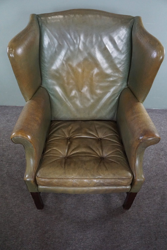 Image 1 of Green vintage cowhide leather wing chair