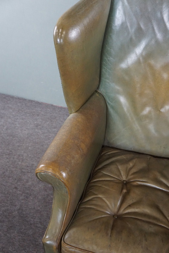 Image 1 of Green vintage cowhide leather wing chair