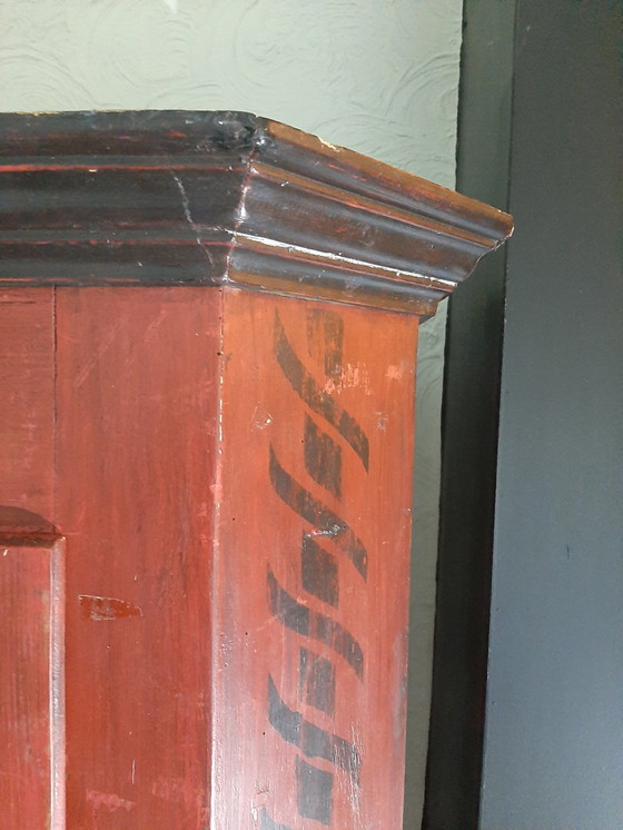 Image 1 of Practical Red Cupboard