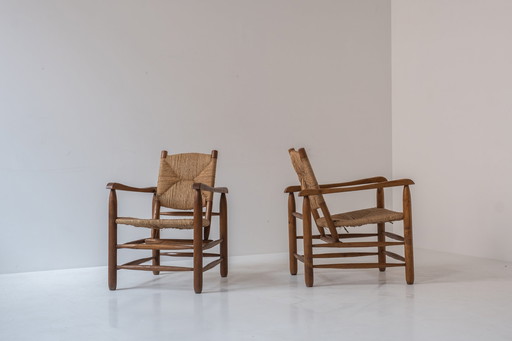 Rare paire de fauteuils modèle 'Chamrousse' par Charlotte Perriand pour Steph Simon, France 1940's.