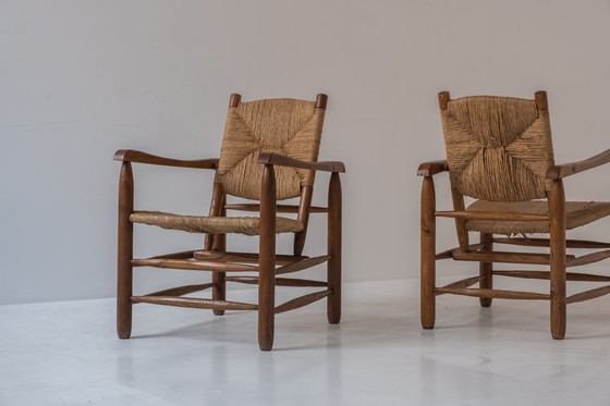 Image 1 of Rare paire de fauteuils modèle 'Chamrousse' par Charlotte Perriand pour Steph Simon, France 1940's.