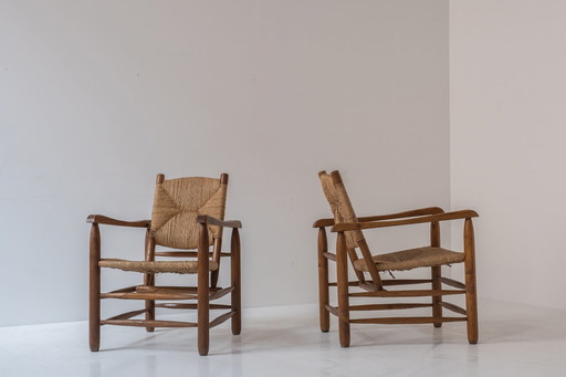 Rare paire de fauteuils modèle 'Chamrousse' par Charlotte Perriand pour Steph Simon, France 1940's.