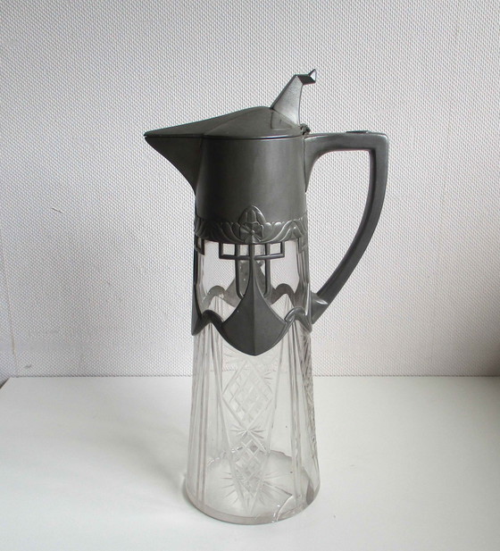 Image 1 of Carafe art nouveau en verre avec cadre en étain