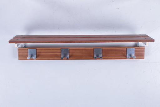 Vintage wall coat rack with chrome and 8 hooks.