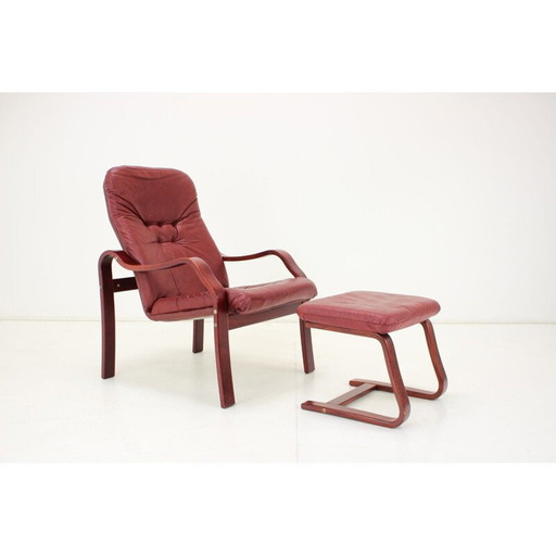 Vintage leather armchair with footrest by Ton, Czechoslovakia 1980