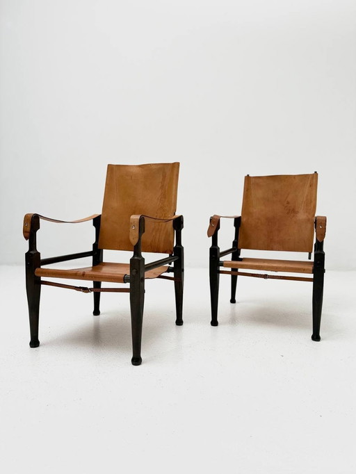 Set of 2 safari armchairs in leather & oak by Wilhelm Kienzle for home furnishings, 1950s