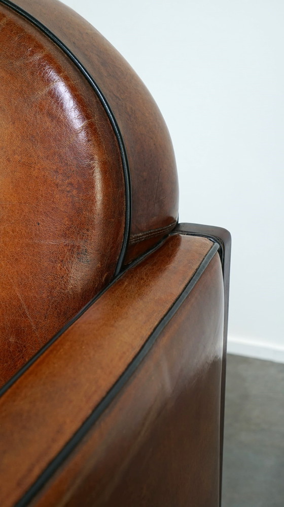 Image 1 of Sheep leather ArtDeco design armchair finished with wood