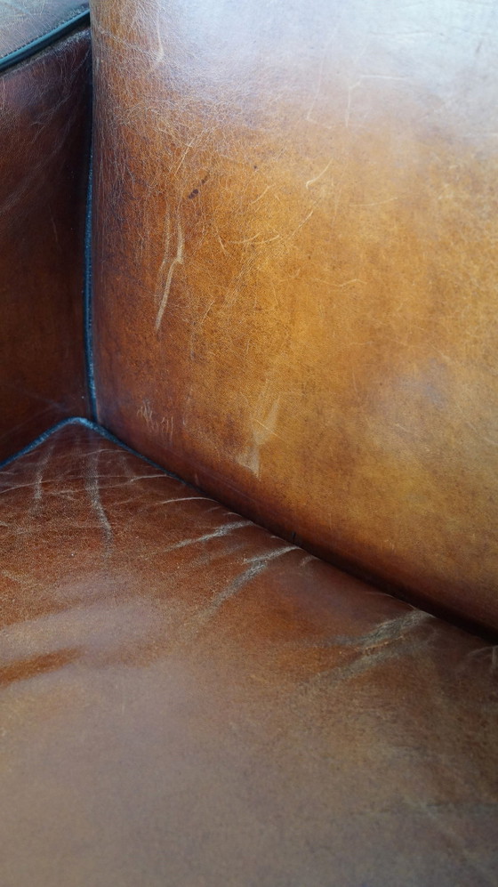 Image 1 of Sheep leather ArtDeco design armchair finished with wood