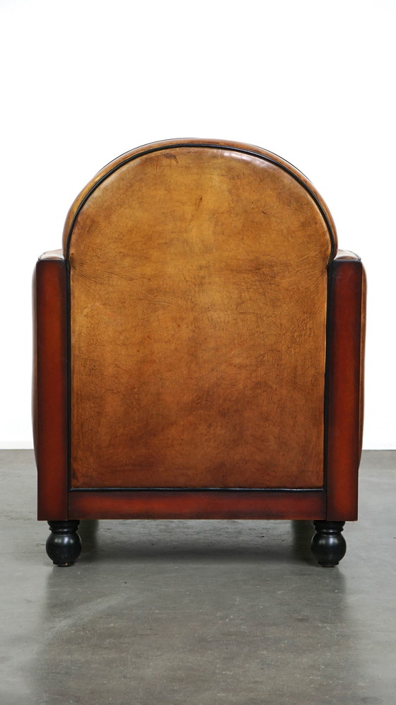 Image 1 of Sheep leather ArtDeco design armchair finished with wood