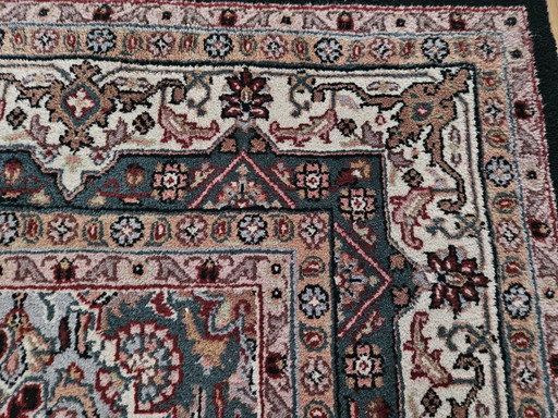 Persian hand-knotted carpet