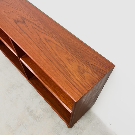 Image 1 of Open teak chest of drawers with steel feet