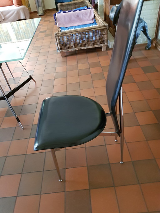 6 Glass table and leather chairs