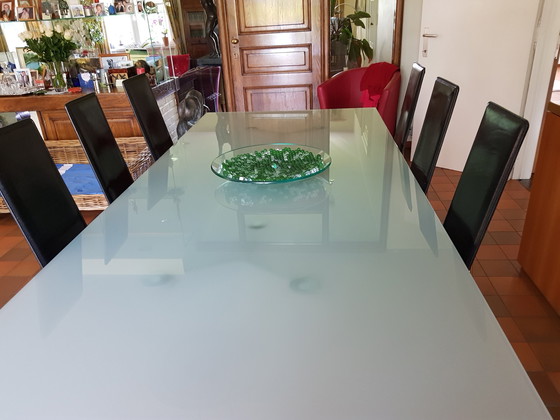 Image 1 of 6 Glass table and leather chairs