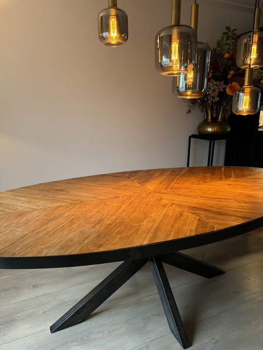 Oval Dining Table Herringbone With Industrial Side And Steel Star Leg