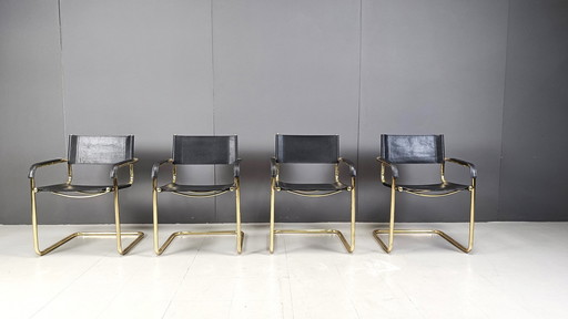 Ensemble de 4 chaises de salle à manger cantilever en cuir noir et laiton - années 1970