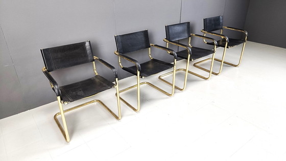 Image 1 of Set of 4 black leather and brass cantilever dining chairs - 1970s