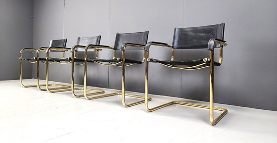 Image 1 of Set of 4 black leather and brass cantilever dining chairs - 1970s