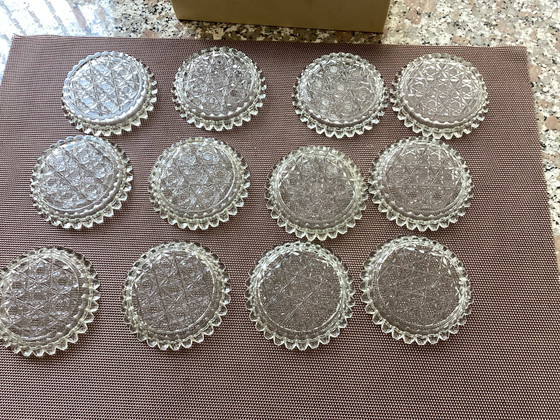 Image 1 of 1x2 glass coasters made of cut glass .