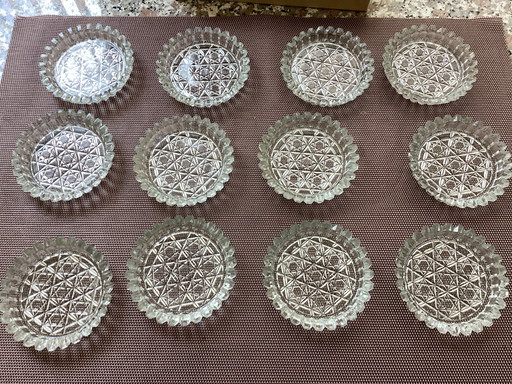 1x2 glass coasters made of cut glass .