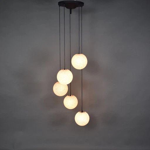 Beautiful chandelier with five spheres