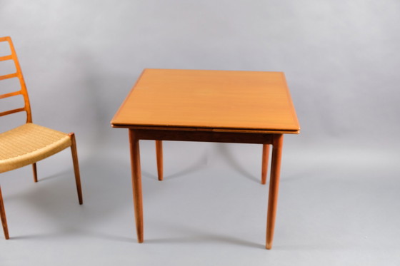 Image 1 of Extendable square mid-century teak dining table