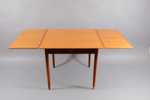 Extendable square mid-century teak dining table