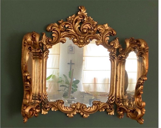 Original. Fabulous baroque mirror with wing .