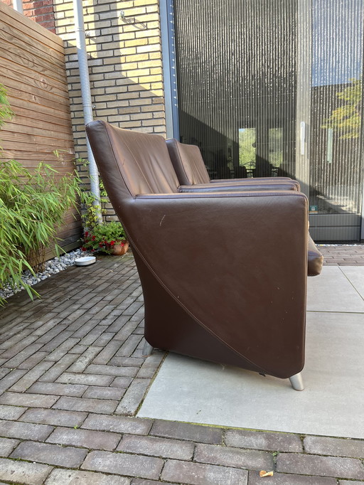 2x fauteuils Leolux Dolcinea avec jeu de pieds en bois supplémentaire