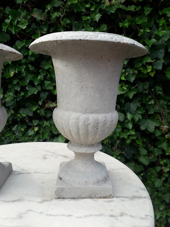 Image 1 of 2 Cast iron brocante vases 32 cm high