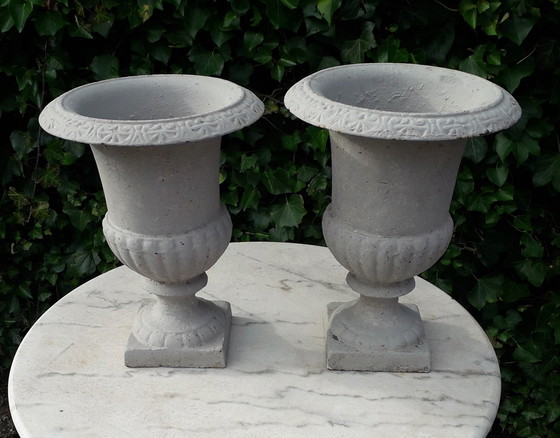 Image 1 of 2 Cast iron brocante vases 32 cm high